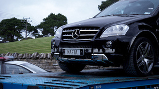 Here Are MegaUpload's Kim Schmitz's Cars Being Seized